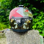 Axor Apex Infinity full face helmet black gold – clear visor front view