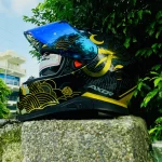 Axor Apex Infinity full face helmet black gold – iridium blue visor open tilted front