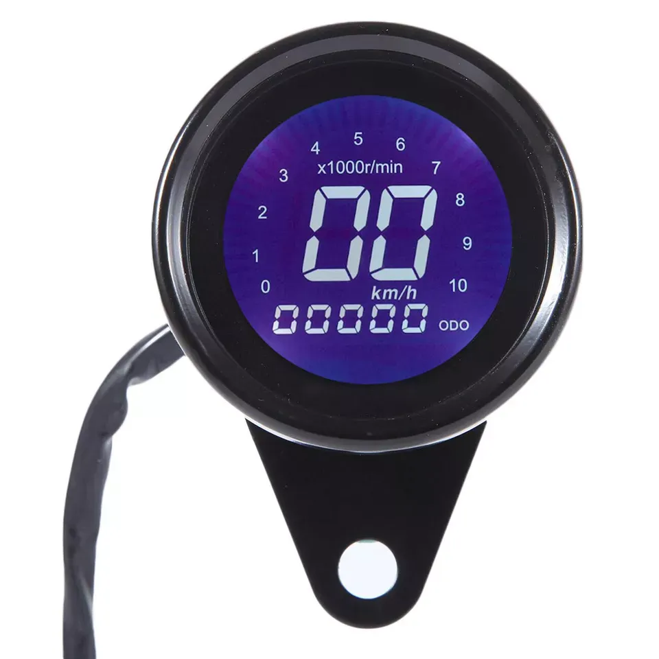 Illuminated black digital gauge at night with indicator lights Universal speedometer gauge